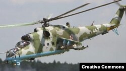 Российский суперсовременный военный вертолет Ми-35. "Шпионы" могут охотиться на него, а "разведчики" - за тонким электронным оборудованием для него.