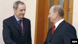 Жан-Клод Килли и Владимир Путин в Сочи, сентябрь 2008 года