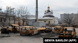 Последствия ракетного обстрела российскими гибридными силами микрорайона «Восточный» Мариуполя, который был осуществлен 24 января 2015 года. Тогда 29 человек погибли и 92 были ранены