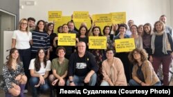 Леанід Судаленка з праваабаронцамі Amnesty International Italia