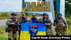 Бойцы батальона Национальной полиции Украины «Запад» после освобождения города Лимана от российской армии. Лиман, Донецкая область, 2 октября 2022 года