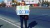 "Я боюсь за себя и детей, но..." Активистке, "оскорбившей" Путина, угрожают расправой 