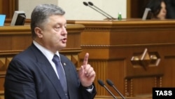 Ukraine – Ukrainian President Petro Poroshenko addresses deputies before voting for changes in the constitution on decentralizing power at the parliament in Kyiv, July 16, 2014