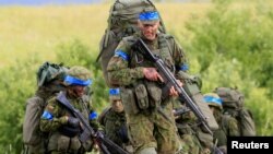 Lithuania -- Lithuanian army soldiers take part in Suwalki gap defence exercise in Mikyciai, June 17, 2017